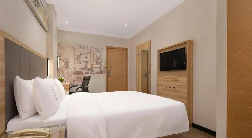 Bed in City Comfort Inn Changsha Window of the World Zhongmao City