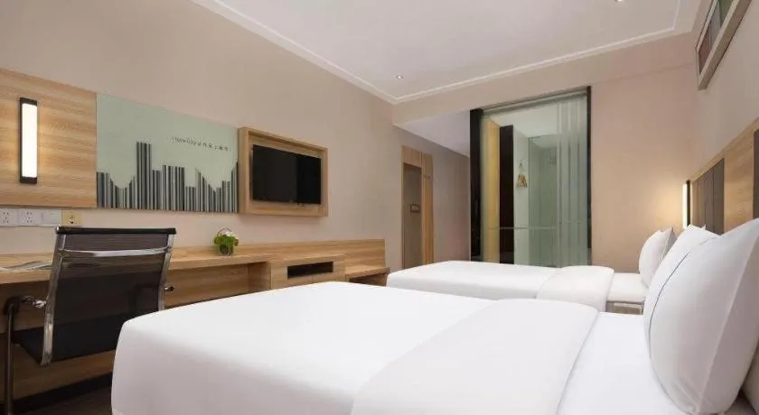 Bed in City Comfort Inn Changsha Window of the World Zhongmao City