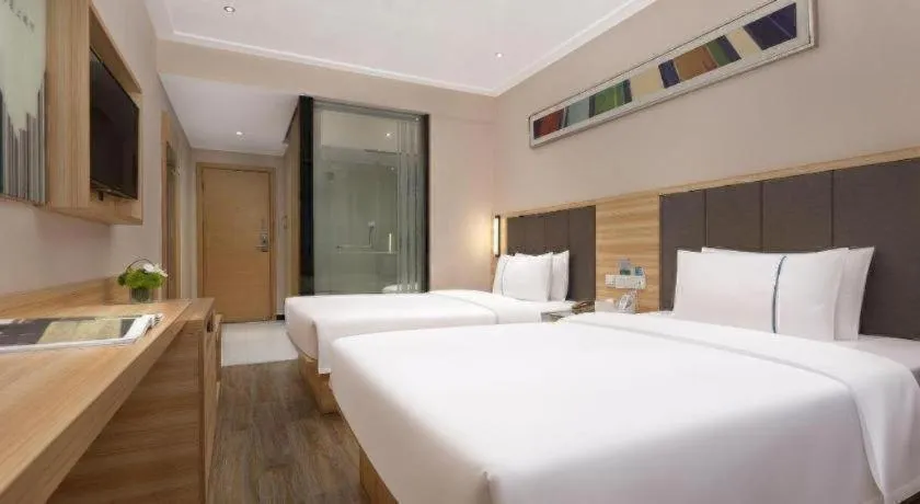 Bed in City Comfort Inn Changsha Window of the World Zhongmao City