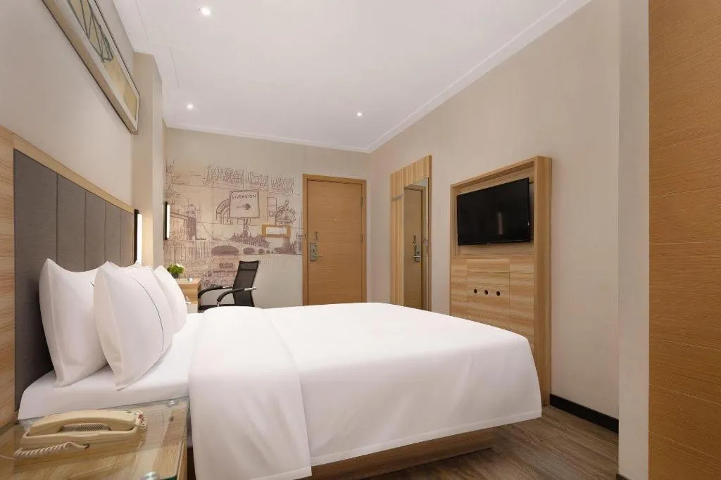 Bed in City Comfort Inn Changsha Window of the World Zhongmao City