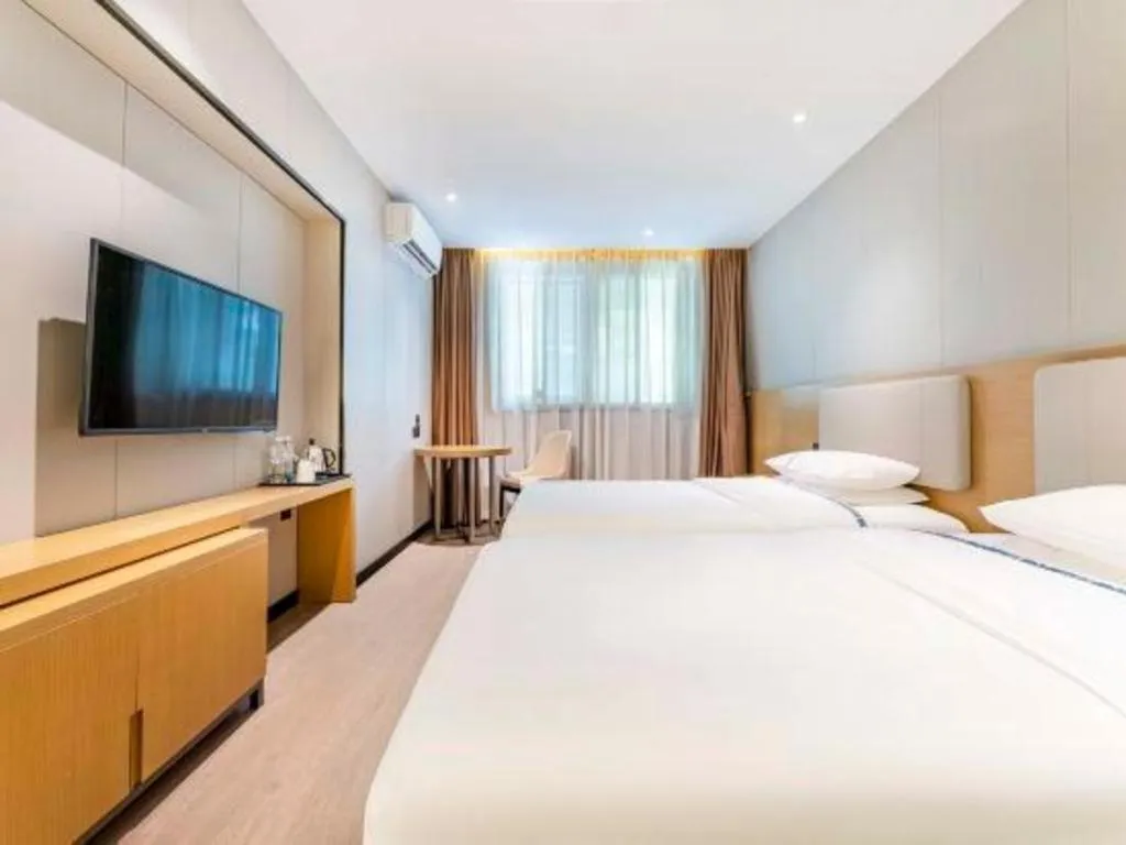 Bed in City Comfort Inn Guangzhou Shixi Metro Station Pazhou Exhibition