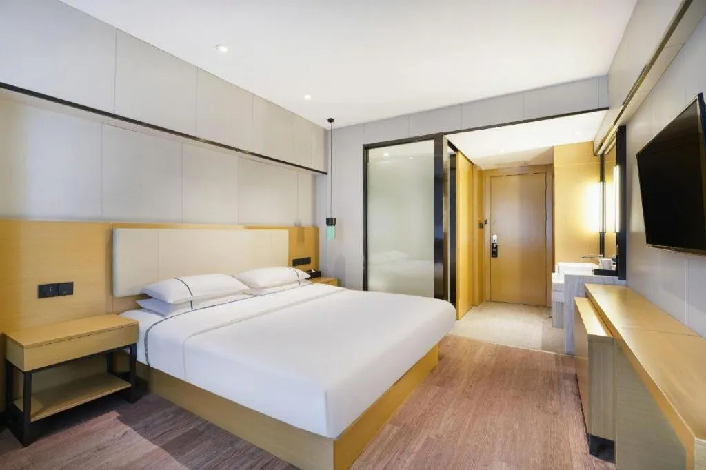 Bed in City Comfort Inn Guangzhou Shixi Metro Station Pazhou Exhibition