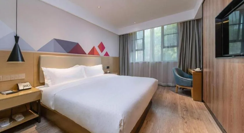 Bed in City Comfort Inn Guangzhou Shixi Metro Station Pazhou Exhibition