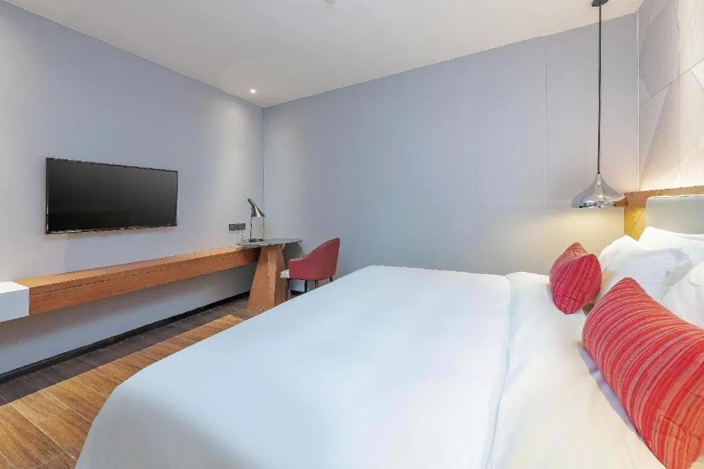 Bed in Borrman Hotel Guigang Pingnan Donghu