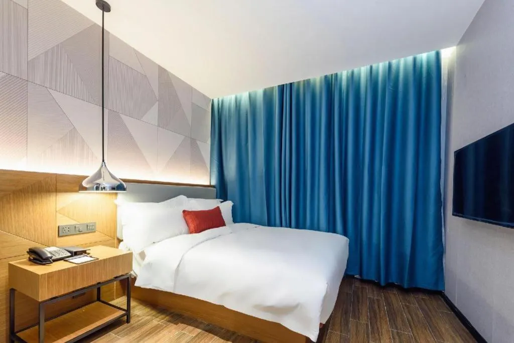 Bed in Borrman Hotel Guigang Pingnan Donghu