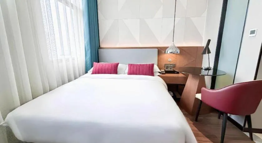 Bed in Borrman Hotel Guigang Pingnan Donghu