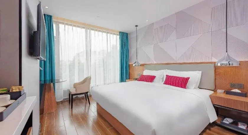 Bed in Borrman Hotel Guigang Pingnan Donghu