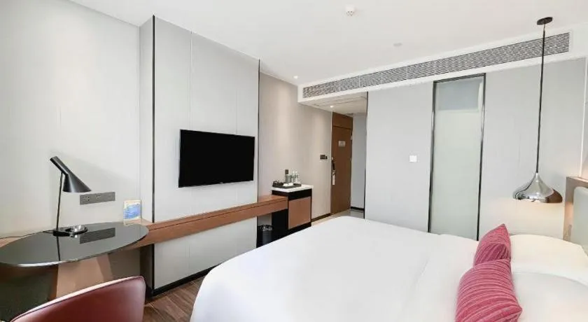 Bed in Borrman Hotel Guigang Pingnan Donghu