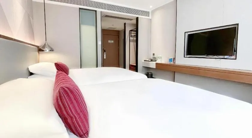 Bed in Borrman Hotel Guigang Pingnan Donghu