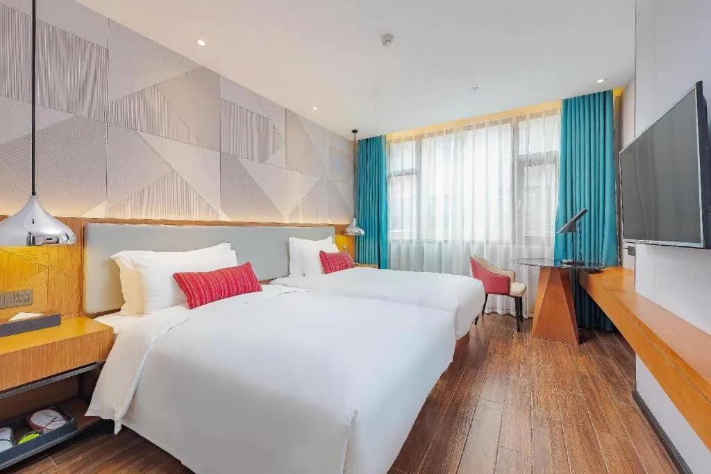 Bed in Borrman Hotel Guigang Pingnan Donghu