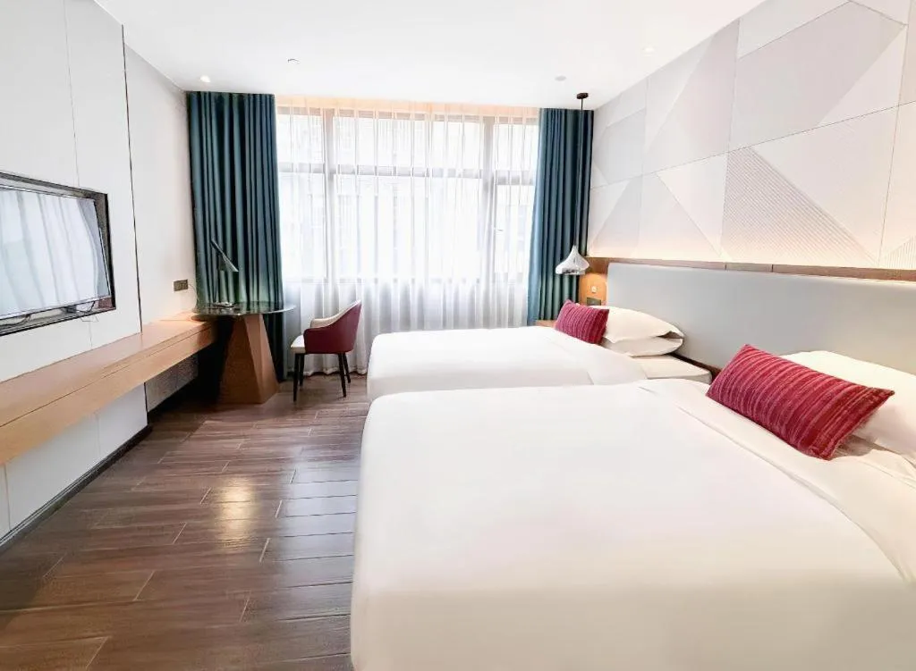 Bed in Borrman Hotel Guigang Pingnan Donghu