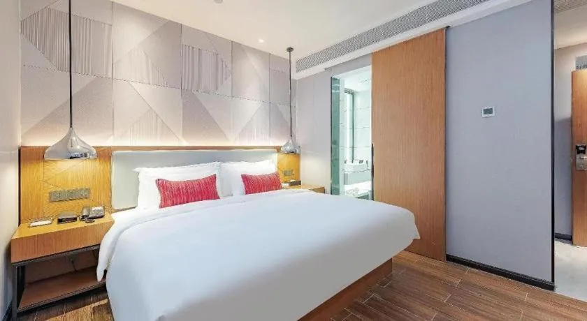 Bed in Borrman Hotel Guigang Pingnan Donghu