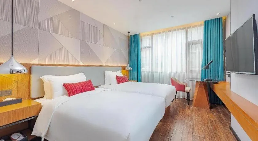 Bed in Borrman Hotel Guigang Pingnan Donghu