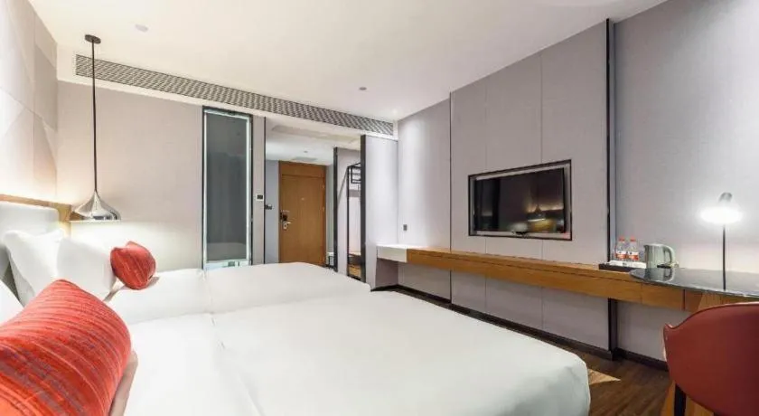 Bed in Borrman Hotel Guigang Pingnan Donghu