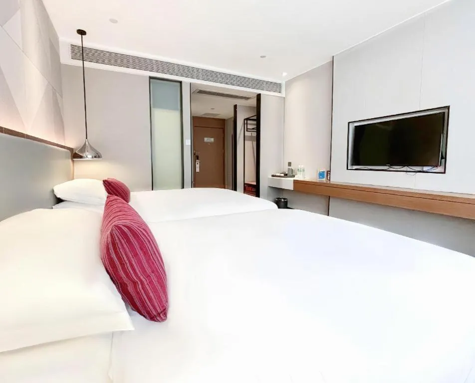 Bed in Borrman Hotel Guigang Pingnan Donghu