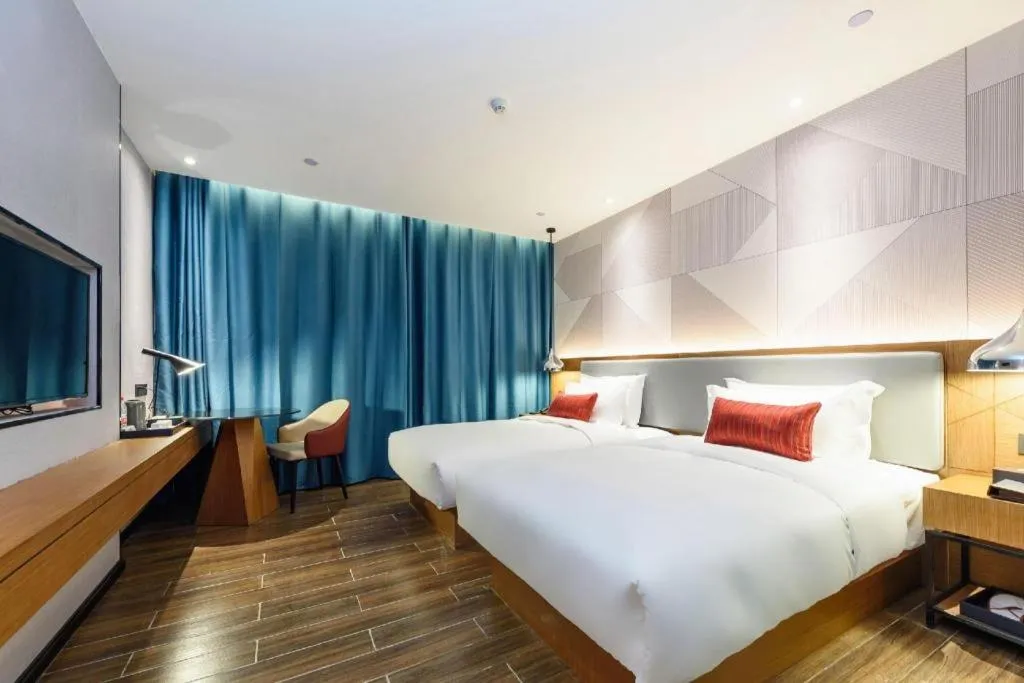 Bed in Borrman Hotel Guigang Pingnan Donghu