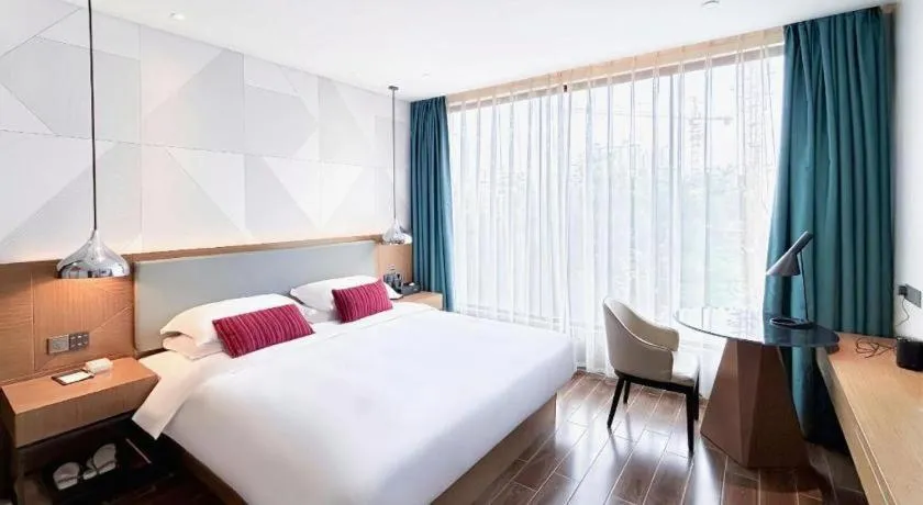 Bed in Borrman Hotel Guigang Pingnan Donghu