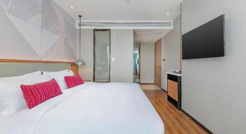 Bed in Borrman Hotel Guigang Pingnan Donghu