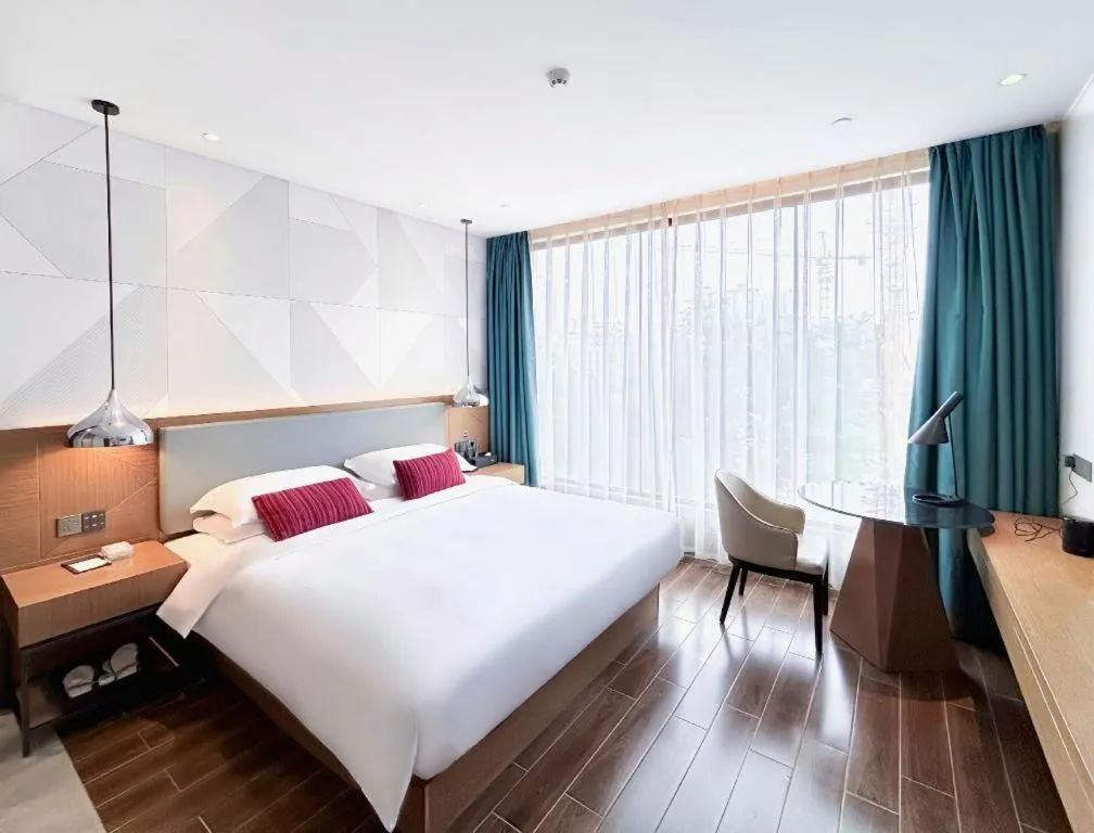 Bed in Borrman Hotel Guigang Pingnan Donghu