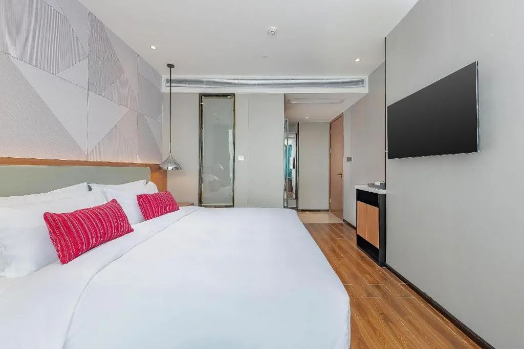 Bed in Borrman Hotel Guigang Pingnan Donghu