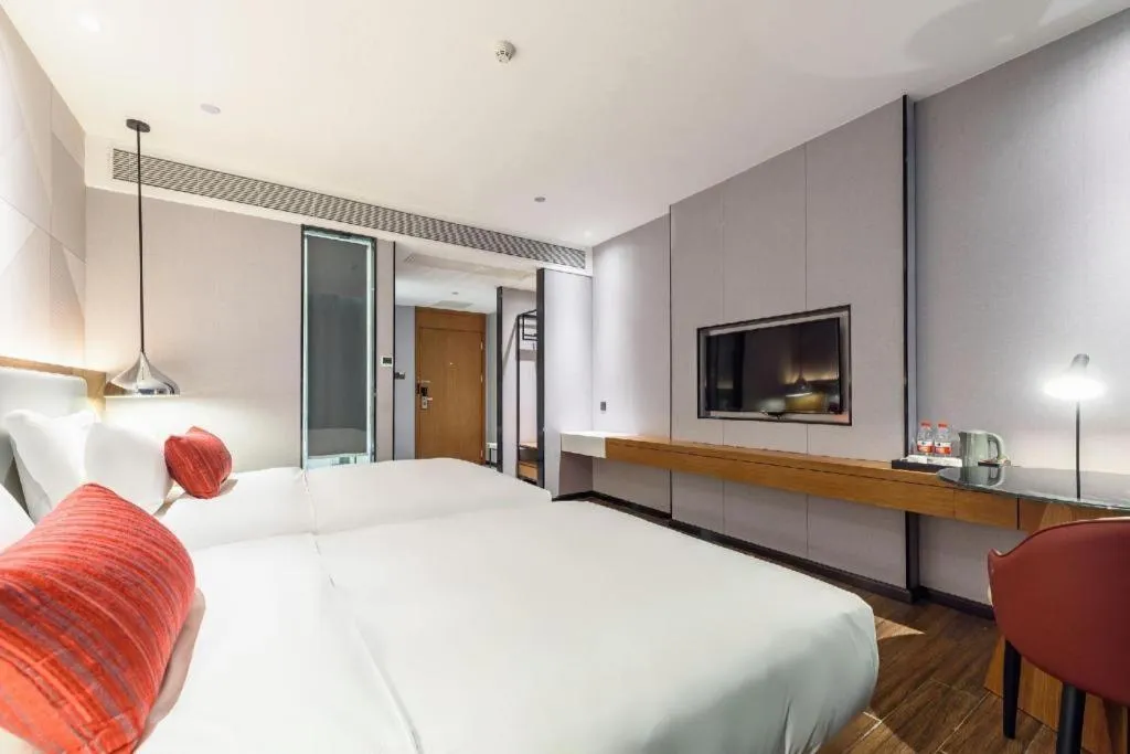 Bed in Borrman Hotel Guigang Pingnan Donghu