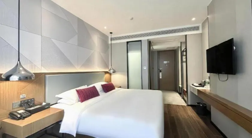 Bed in Borrman Hotel Guigang Pingnan Donghu