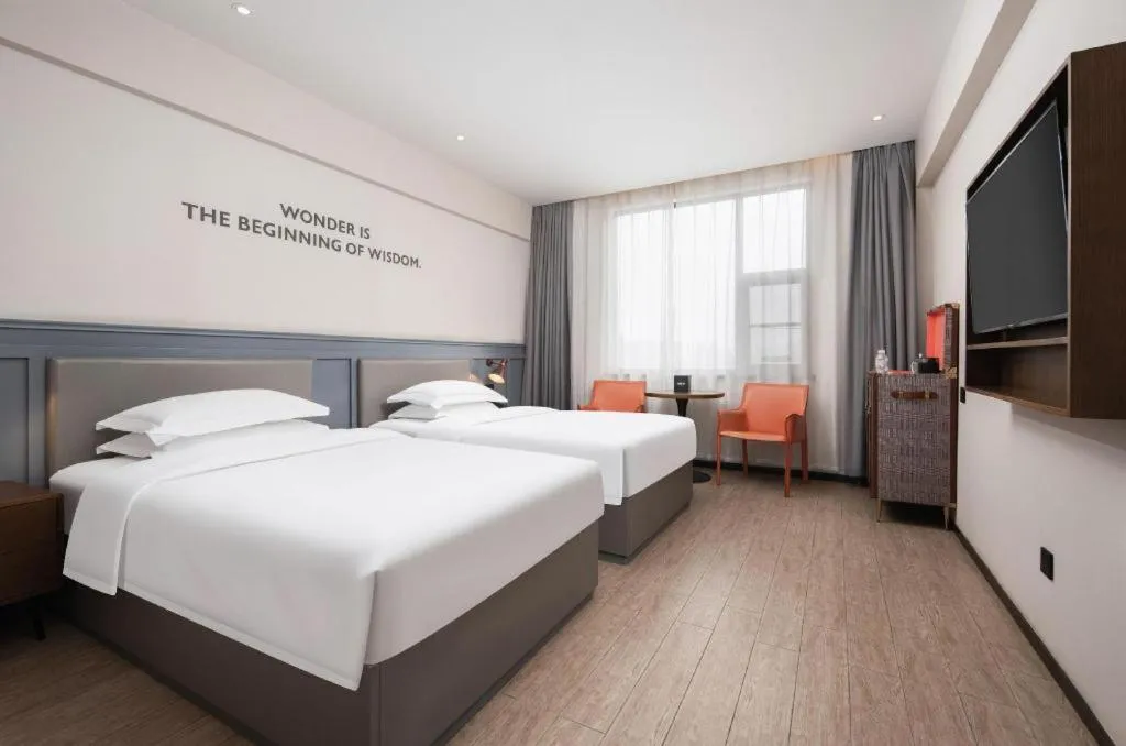 Bed in City Comfort Premier Hotel Wuhan Wangjiawan Hanyang Bus Station Metro Station