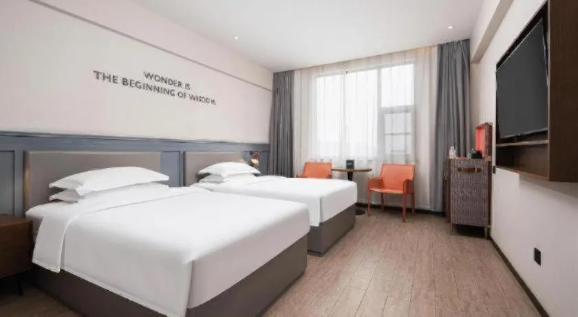 Bed in City Comfort Premier Hotel Wuhan Wangjiawan Hanyang Bus Station Metro Station