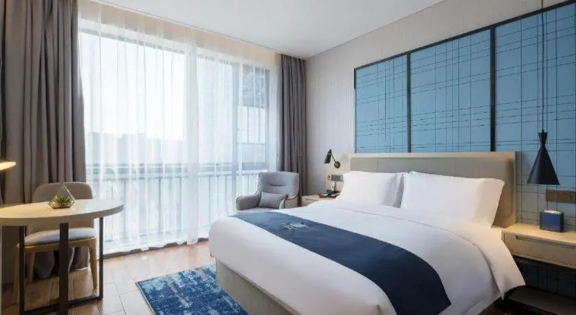 Bed in Echarm Hotel Changsha Yuelu Mountain West Bus Station Metro Station