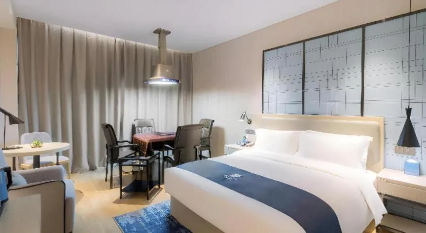 Bed in Echarm Hotel Changsha Yuelu Mountain West Bus Station Metro Station