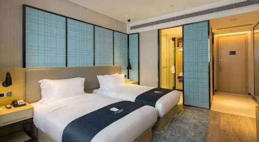 Bed in Echarm Hotel Changsha Yuelu Mountain West Bus Station Metro Station