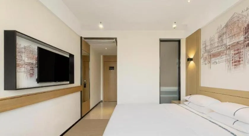 Bed in City Comfort Inn Nanchang Zhangshulin Shashagou Metro Station