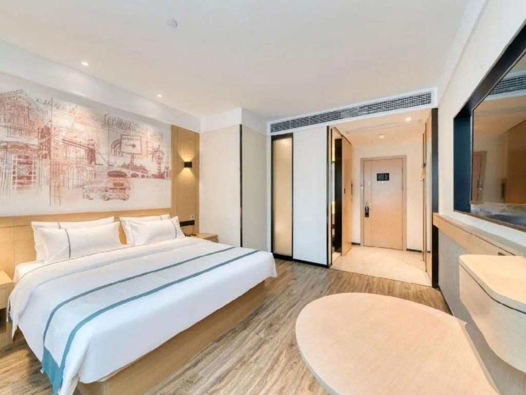 Bed in City Comfort Inn Nanchang Zhangshulin Shashagou Metro Station