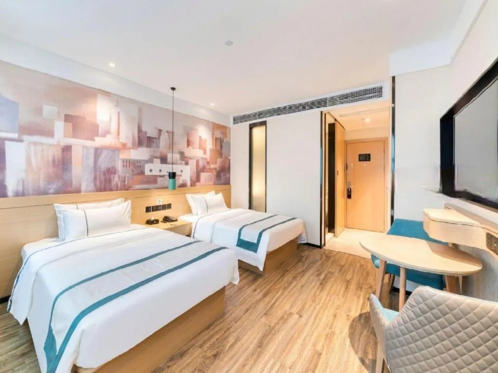 Bed in City Comfort Inn Nanchang Zhangshulin Shashagou Metro Station