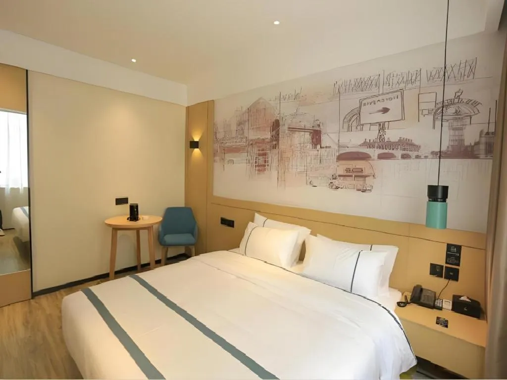 Bed in City Comfort Inn Nanchang Zhangshulin Shashagou Metro Station