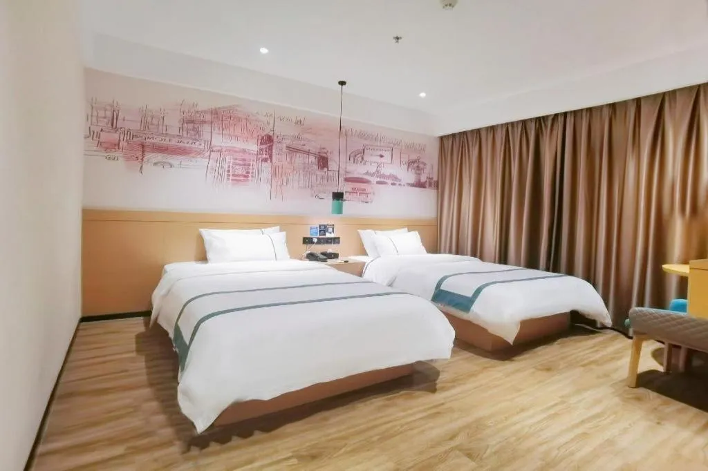 Bed in City Comfort Inn Nanchang Zhangshulin Shashagou Metro Station