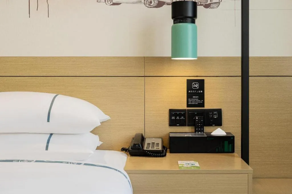 Bed in City Comfort Inn Nanchang Zhangshulin Shashagou Metro Station