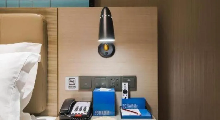 Bed in Echarm Hotel Changsha Wuyi Square Railway Metro Station