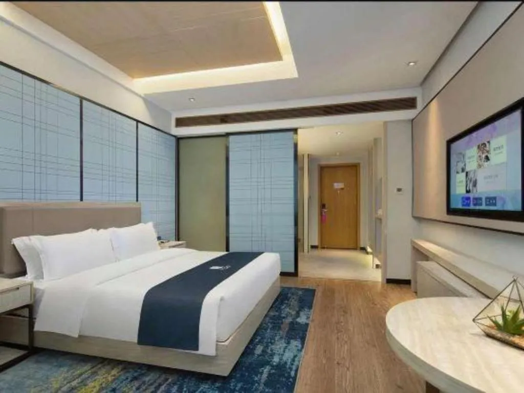Bed in Echarm Hotel Changsha Wuyi Square Railway Metro Station