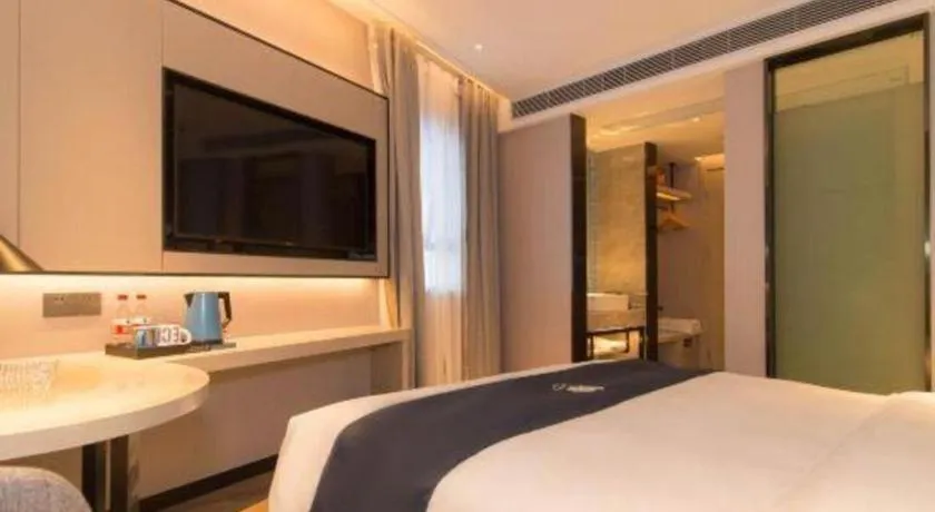 Bed in Echarm Hotel Changsha Wuyi Square Railway Metro Station