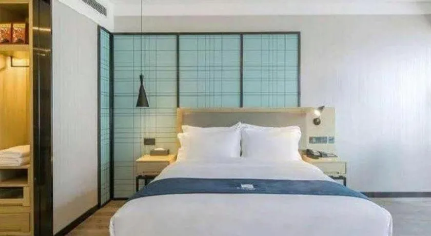 Bed in Echarm Hotel Changsha Wuyi Square Railway Metro Station