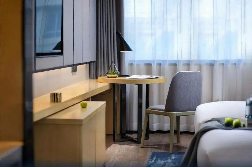 Bed in Echarm Hotel Changsha Wuyi Square Railway Metro Station