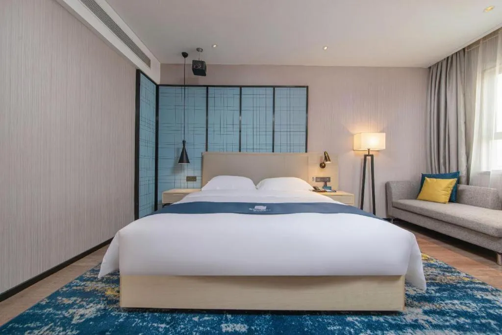 Bed in Echarm Hotel Nanchang Bayi Square Metro Station Wushang MALL