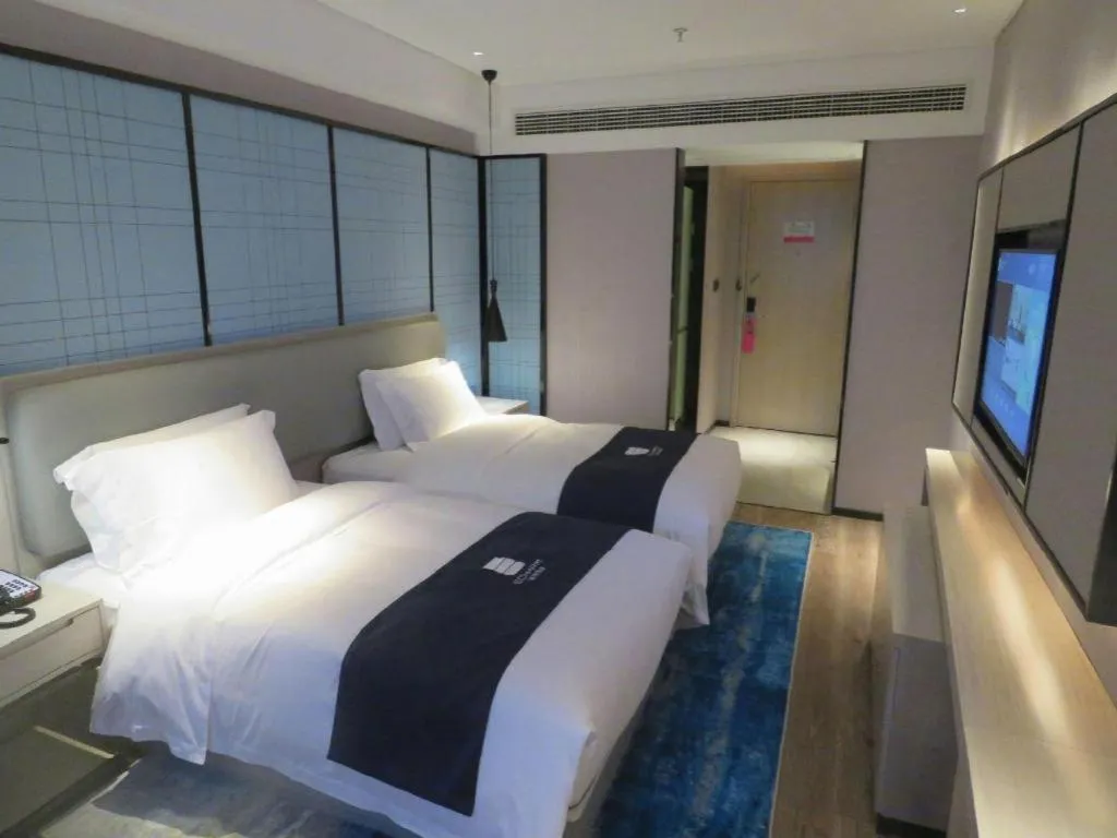 Bed in Echarm Hotel Nanchang Bayi Square Metro Station Wushang MALL