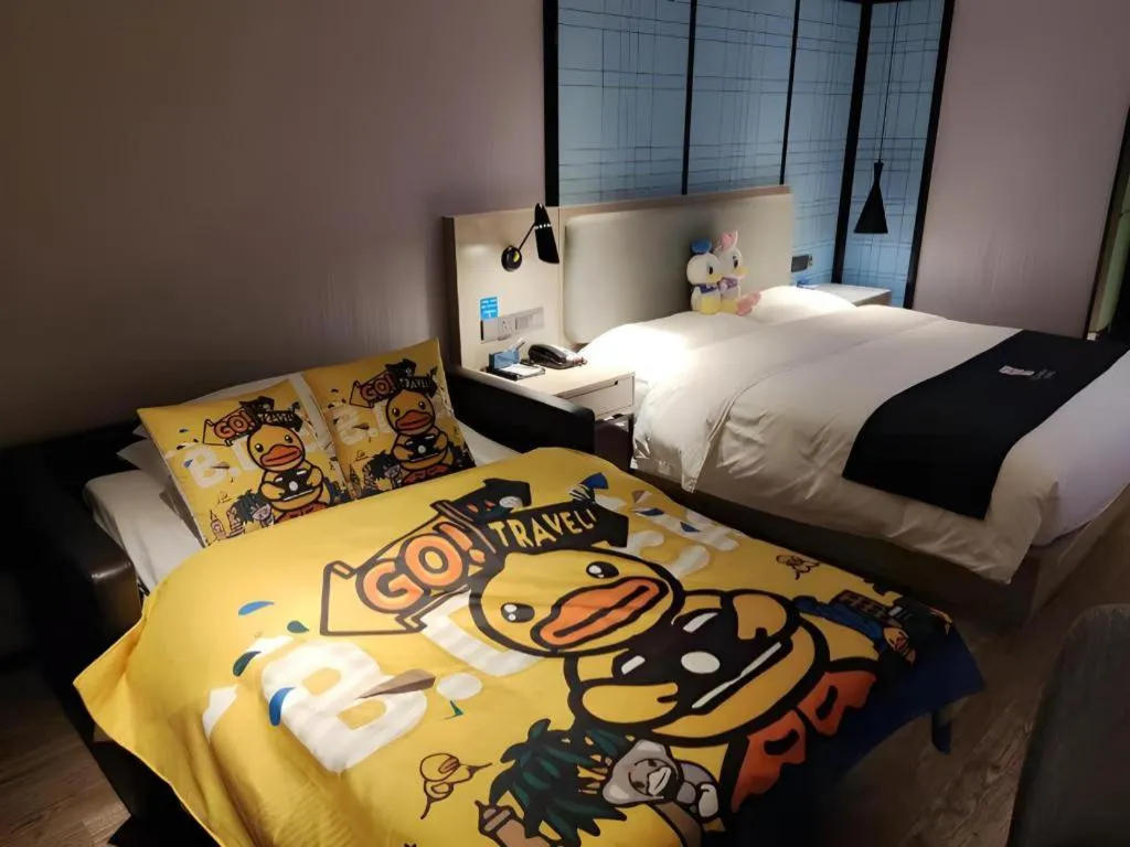 Bed in Echarm Hotel Nanchang Bayi Square Metro Station Wushang MALL