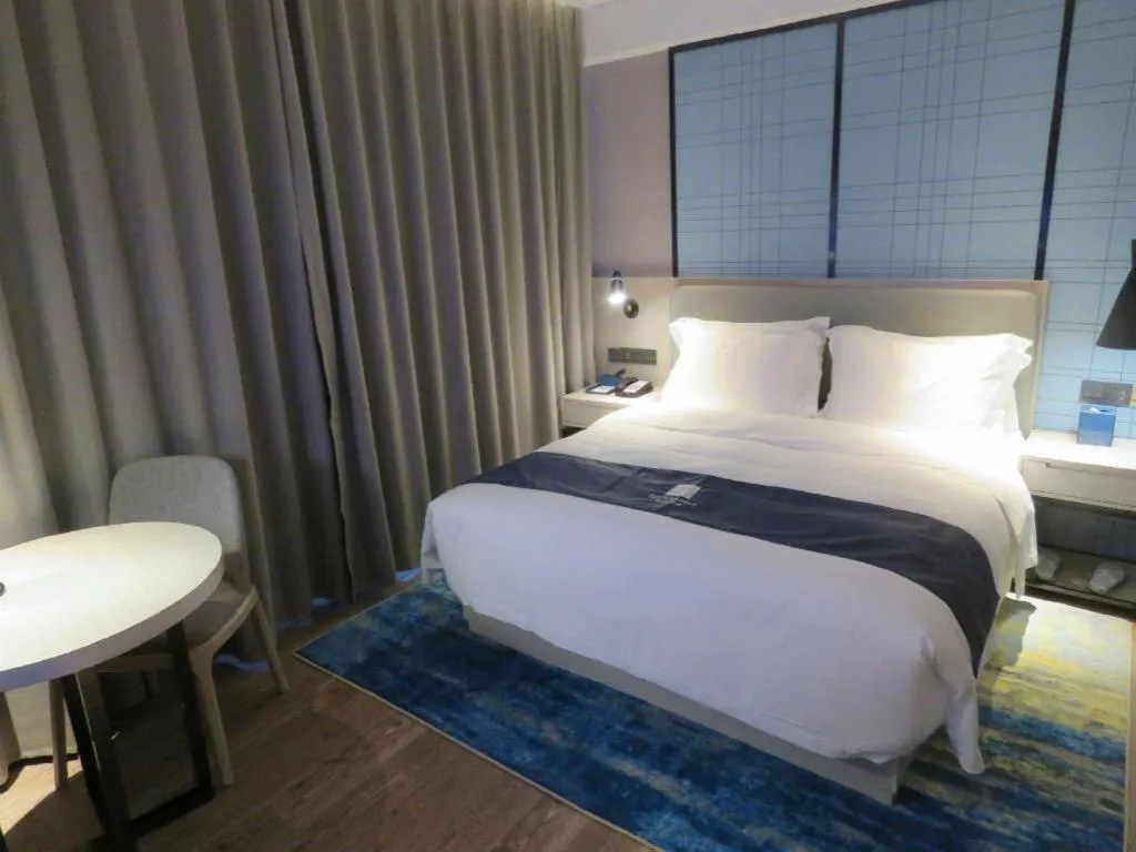 Bed in Echarm Hotel Nanchang Bayi Square Metro Station Wushang MALL