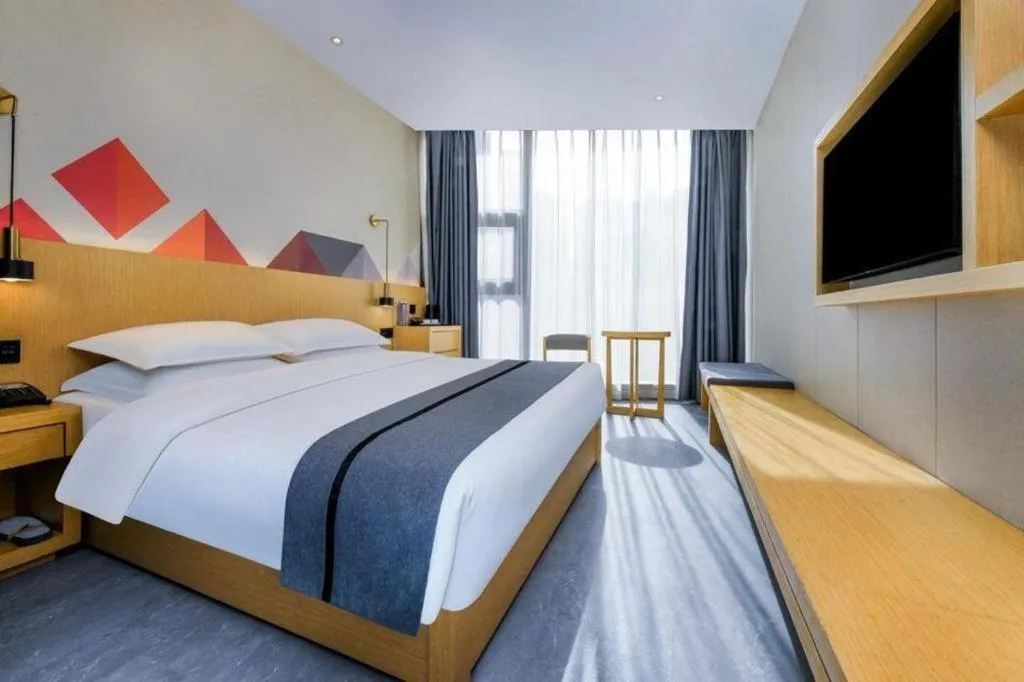 Bed in Borrman Hotel Chongqing Liberation Monument Hongyadong