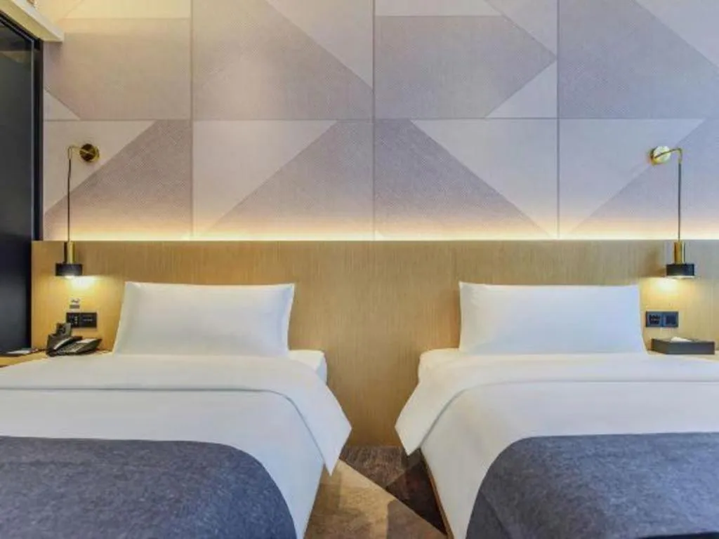 Bed in Borrman Hotel Chongqing Liberation Monument Hongyadong