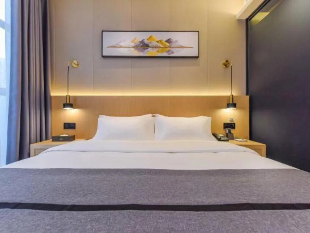 Bed in Borrman Hotel Chongqing Liberation Monument Hongyadong