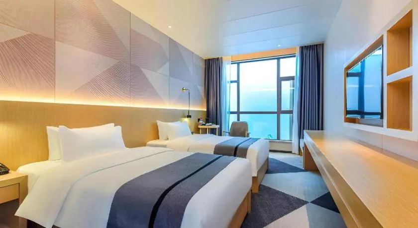 Bed in Borrman Hotel Chongqing Liberation Monument Hongyadong